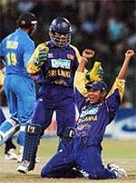 Was this a decisive moment? Tillakaratne Dilshan celebrates his spectacular catch of Rahul Dravid in the Asia Cup final  © AFP